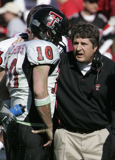 Mike Leach may be getting a raise from Texas Tech rather than a new job in Seattle.  (Associated Press / The Spokesman-Review)