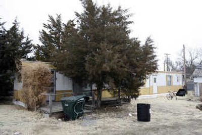 
At the home of Kory McFarren, in Ness City, Kan., the man's girlfriend was found in the bathroom after she stayed there long enough to become stuck to the toilet. Associated Press
 (Associated Press / The Spokesman-Review)