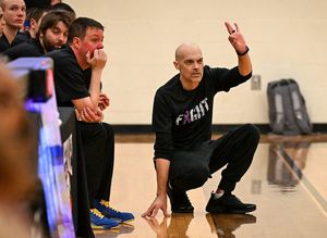 Colfax boys basketball coach Reece Jenkin calls a play during a holiday tournament game against West Valley on Dec. 29 at West Valley. (Colin Mulvany/The Spokesman-Review)