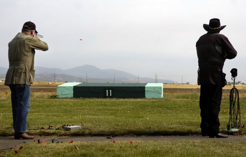 Trapshooters at a range. (The Spokesman-Review)
