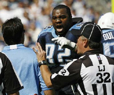
Titans Albert Haynesworth argues after being ejected.
 (Associated Press / The Spokesman-Review)