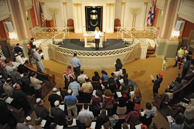 Instead of a rabbi leading the Purim service, Dena Roth, 24, has the honor at Sixth and I Historic Synagogue in Washington, an event sponsored by DC Minyan. Washington Post (Katherine Frey Washington Post / The Spokesman-Review)