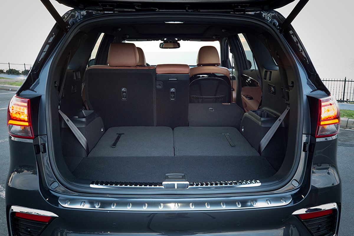 With all three rows up and in place, there’s enough cargo space for a trip to the supermarket but not a Costco run. Folding them yields a 73 cubic-foot cargo hold. (Kia)