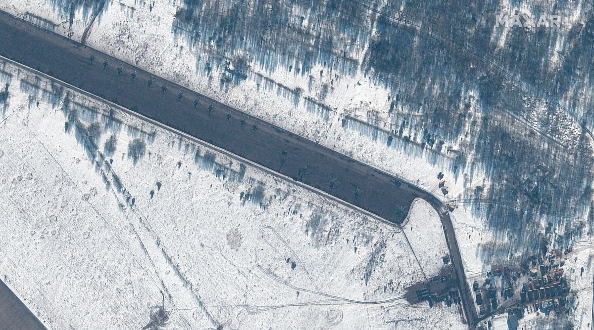 This Feb. 15, 2022 satellite image provided by Maxar Technologies shows attack helicopters deployed at Zyabrovka airfield in Belarus.  (HONS)