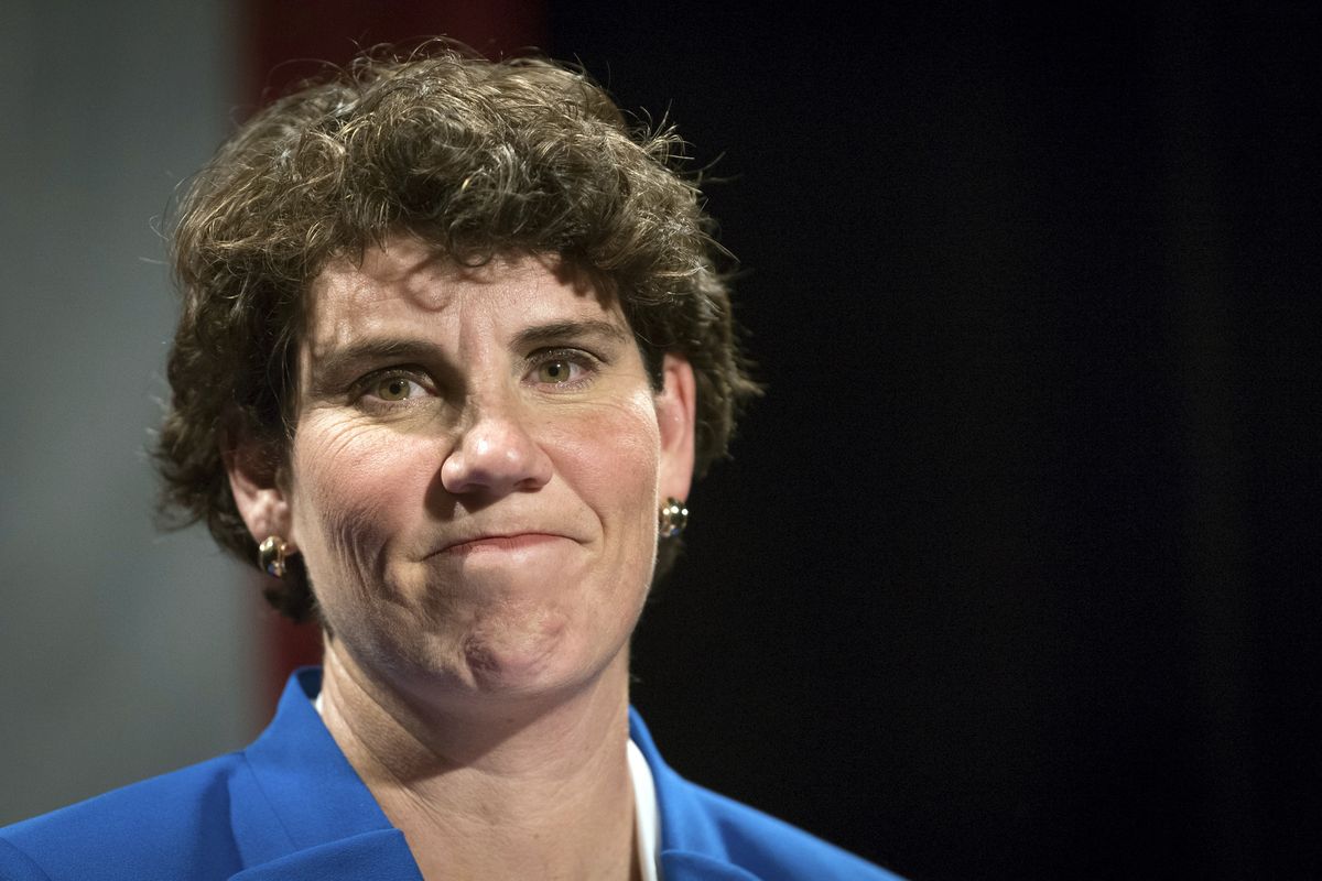 FILE - In this Nov. 6, 2018, file photo, Amy McGrath speaks to supporters in Richmond, Ky. McGrath overcame a bumpier-than-expected Kentucky primary to win the Democratic U.S. Senate nomination Tuesday, June 30, 2020 fending off progressive Charles Booker to set up a bruising, big-spending showdown with Republican Senate Majority Leader Mitch McConnell.  (Bryan Woolston)
