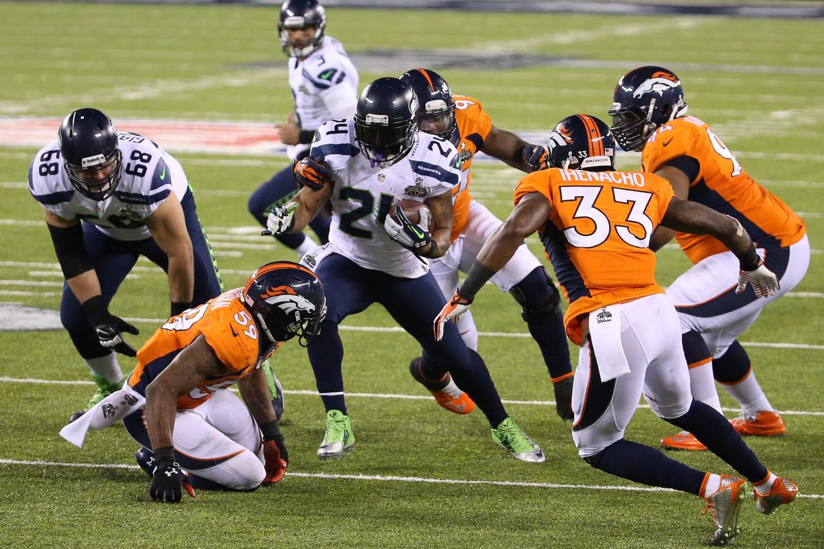 Marshawn Lynch (24) of the Seattle Seahawks looks for running room against the Denver Broncos in the first half of Super Bowl XLVIII at MetLife Stadium in East Rutherford, N.J., on Sunday, Feb. 2, 2014. (Tribune News Service)
