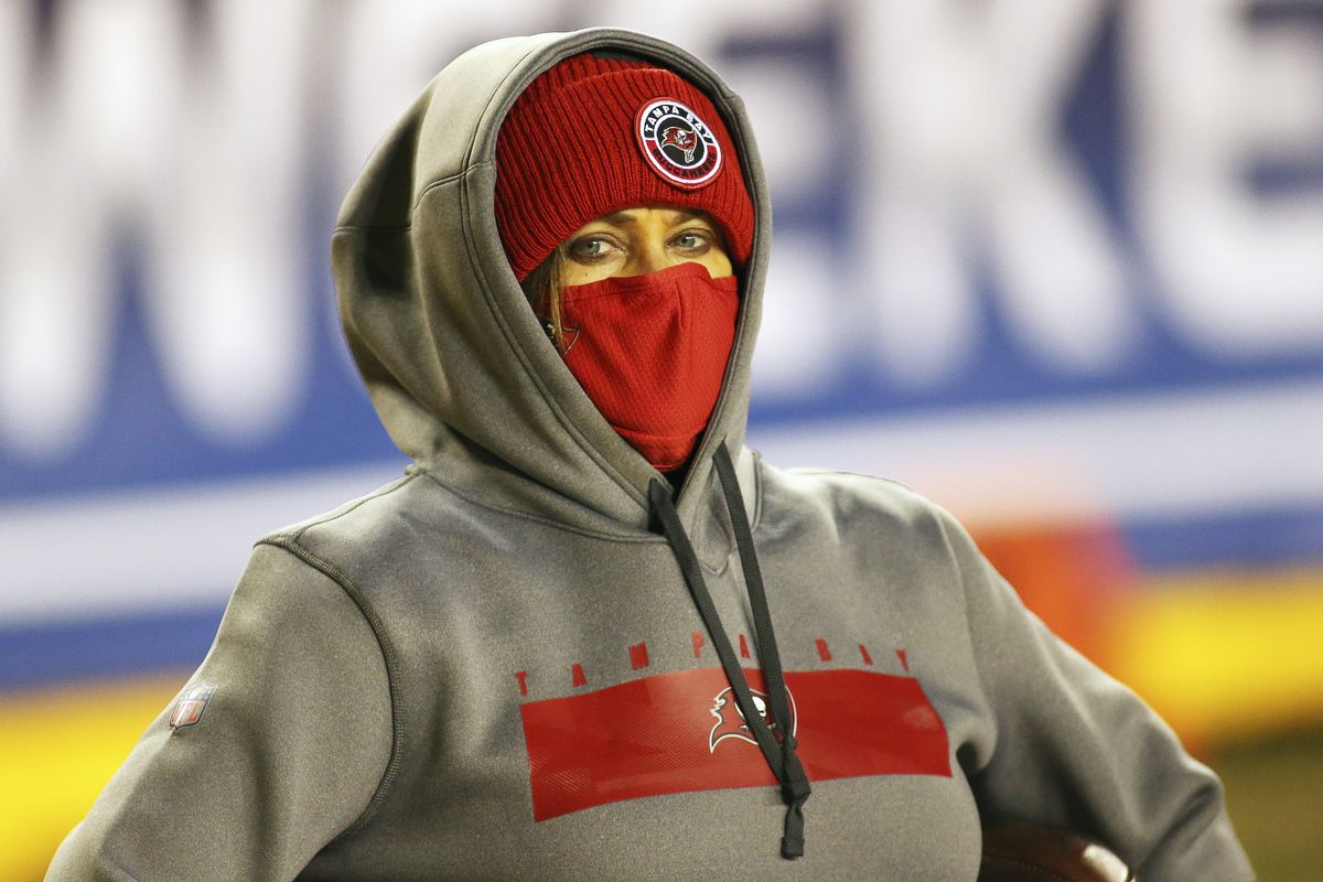 Tampa Bay Buccaneers assistant defensive line coach Lori Locust is all bundled up before an NFC wild-card playoff game against the Washington Football Team on Jan. 9 in Landover, Md. The Bucs won the game 31-23.   (Daniel Kucin Jr.)