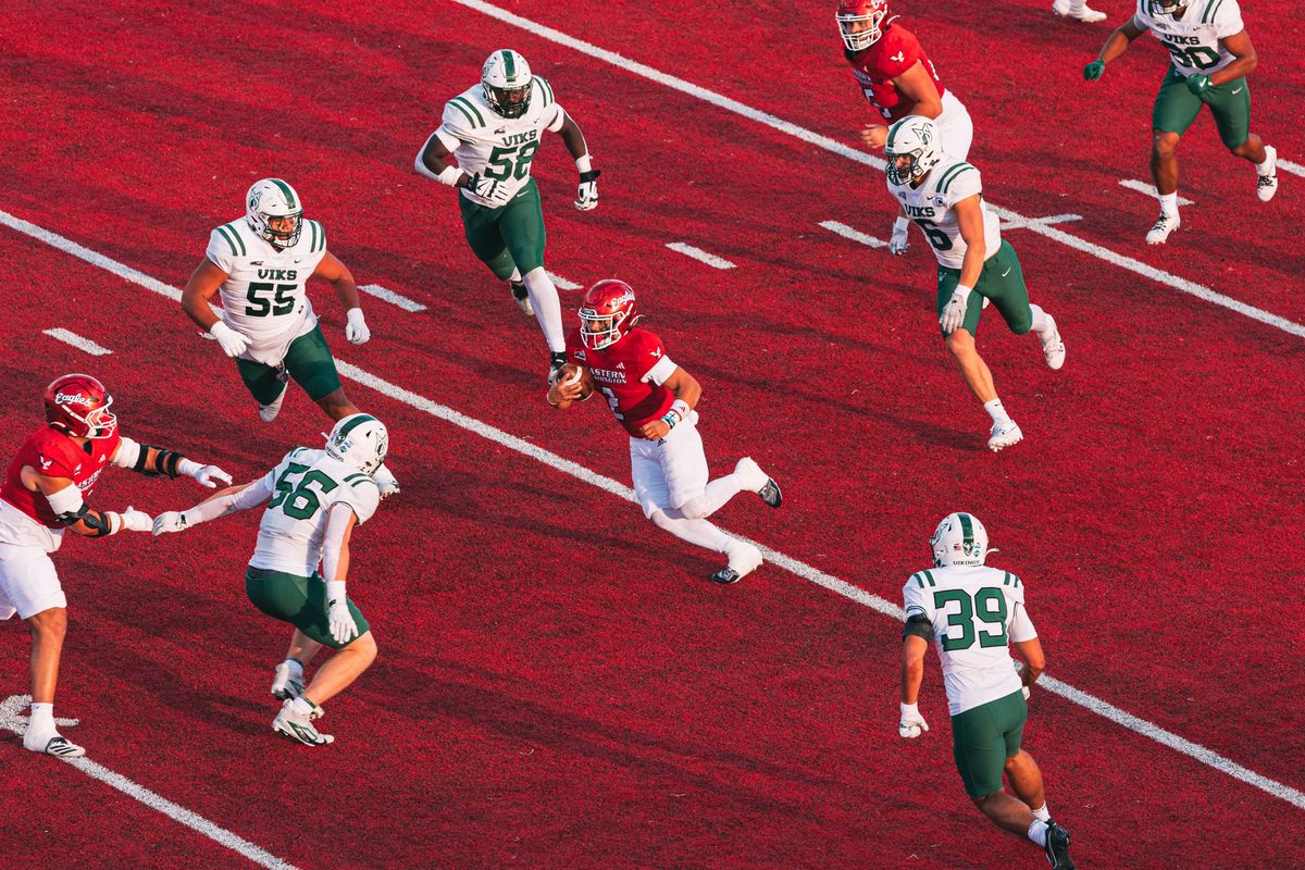 Eastern Washington quarterback Nate Bell tries to find running room through the Portland State defense during a Big Sky Conference game on Saturday in Cheney.  (Courtesy of EWU Athletics)