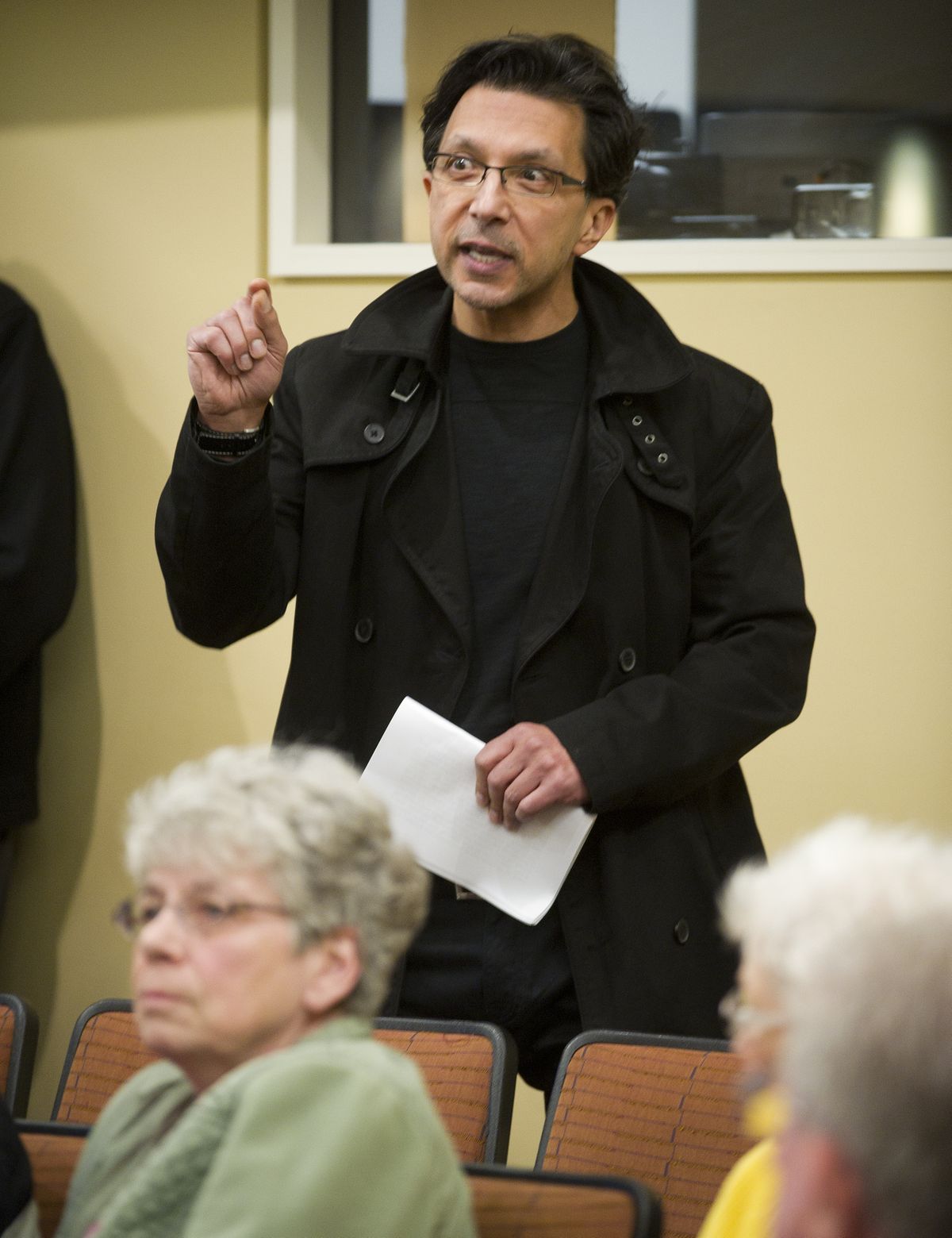 “You have divided the community; we need a new board,” said Nima Motahari during the Northwest Museum of Arts and Culture special board of trustees meeting on Wednesday. Motahari was expressing his displeasure with the firing of MAC Executive Director Forrest Rodgers. (Colin Mulvany)