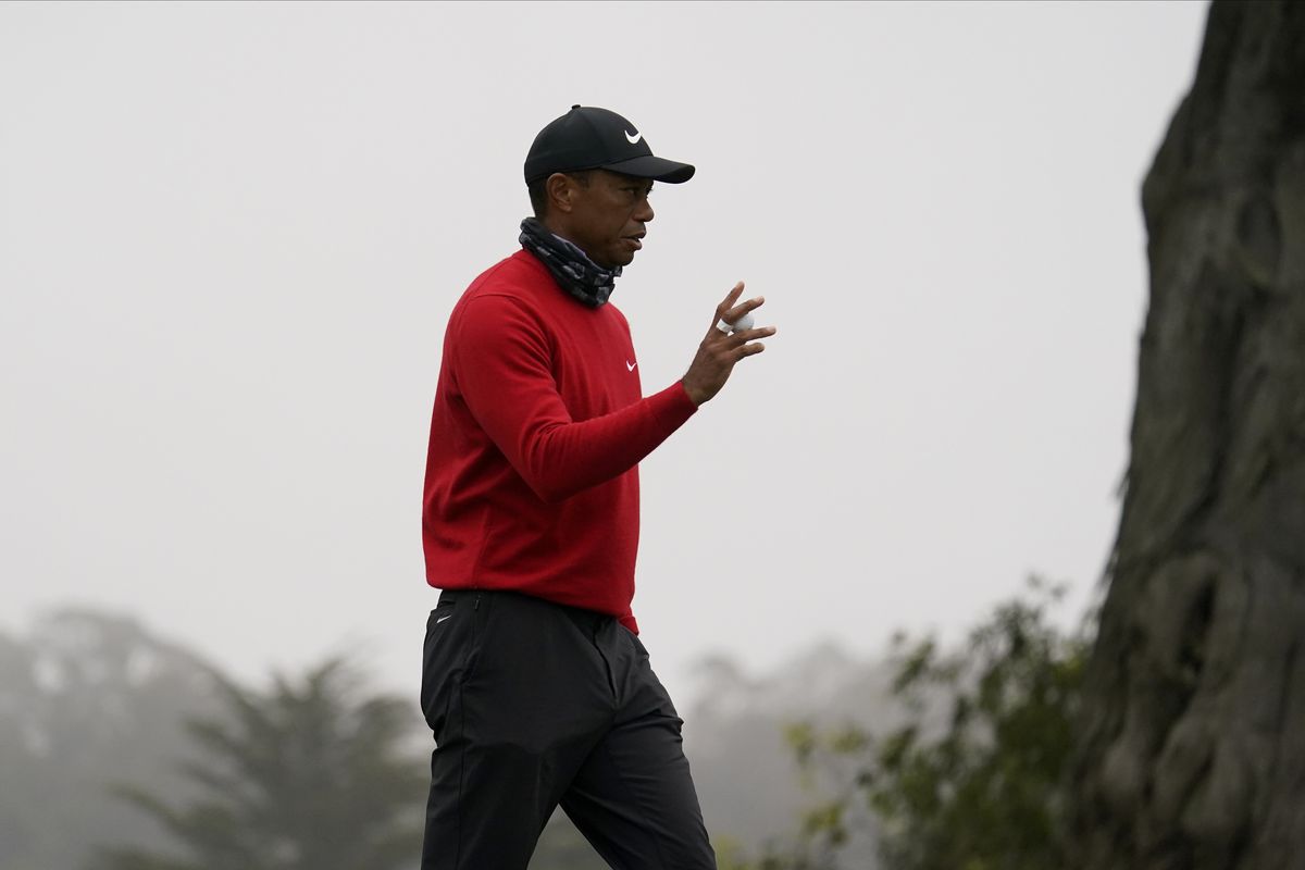 Tiger Woods waves on the 11th hole during the final round of the PGA Championship golf tournament at TPC Harding Park Sunday, Aug. 9, 2020, in San Francisco. (Jeff Chiu)