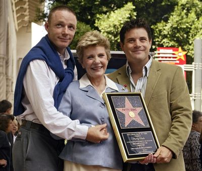 In this Aug. 17, 2004, file photo, Academy Award winner, and television actress Patty Duke poses with her sons, actors Mackenzie Astin, left, and Sean Astin after being honored with a star on the Hollywood Walk of Fame in Los Angeles. (Associated Press file photo)