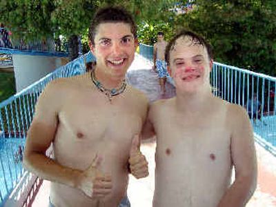 
Chase Odgen shares a moment with a new friend in Dallas.
 (Photos courtesy of Push America / The Spokesman-Review)