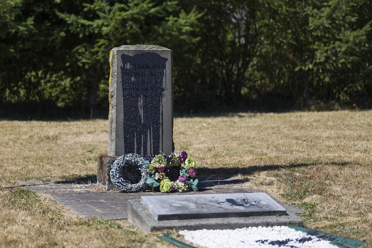 Jefferson Davis highway markers were vandalized at Jefferson Davis Park, Friday, Aug. 18, 2017 in Ridgefield, Wash. Former highway markers honoring Confederate President Jefferson Davis were defaced at a park named for Davis north of Vancouver, Washington. (Andy Bao / AP)