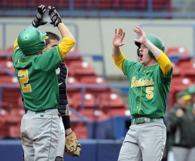 Richland’s Zach Rapacz, left, and Kentin Brunson scored in the fifth inning. (Jesse Tinsley)