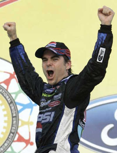 Jeff Gordon celebrates in victory lane after winning the NASCAR Nextel Cup UAW-Ford 500 auto race at Talladega.Associated Press
(Associated Press / The Spokesman-Review)