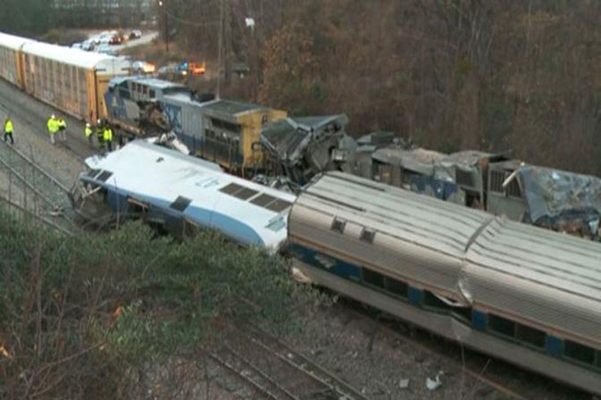 In this image from video, train cars are smashed and derailed Sunday, Feb. 4, 2018, near Cayce, S.C. (Associated Press)