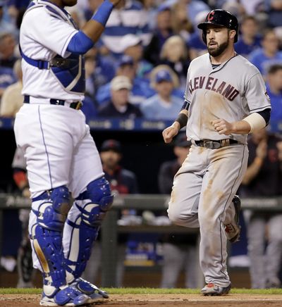 Cleveland’s Jason Kipnis scores winning run after botched replay call Tuesday night. (Associated Press)