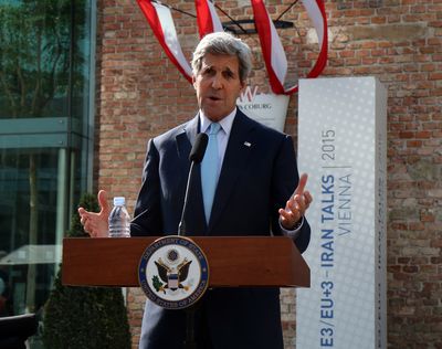 U.S. Secretary of State John Kerry talks to the media in Vienna, Austria, on Sunday. (Associated Press)