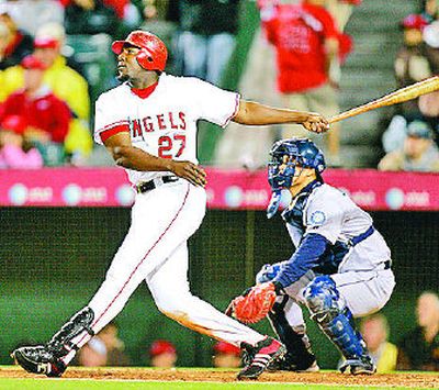 
Los Angeles' Vladimir Guerrero watches his fifth-inning home run sail away. 
 (Associated Press / The Spokesman-Review)