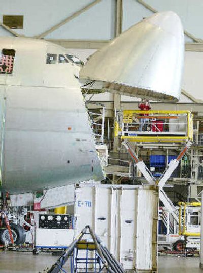 
A Boeing 747-400F is built last year in Everett. Boeing Co. is launching bigger, more efficient versions of its 747 jumbo jet. 
 (Associated Press / The Spokesman-Review)