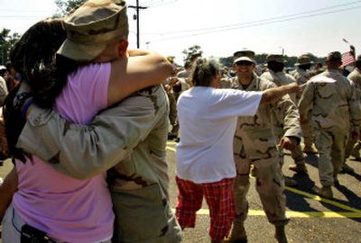 
Louisiana National Guardsmen of the 256th Brigade Combat team are welcomed home from Iraq Friday in Alexandria, La. 
 (Associated Press / The Spokesman-Review)