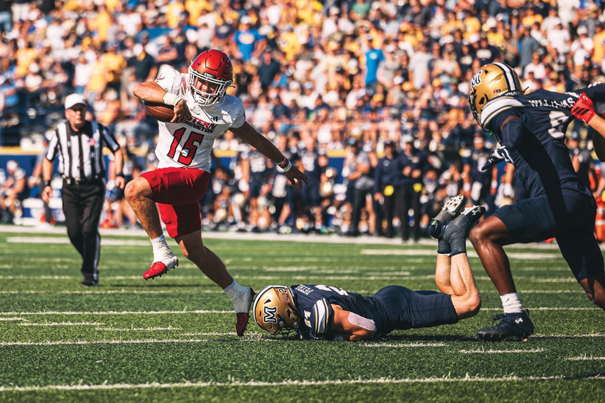 Courtesy of EWU Athletics Eastern Washington quarterback Jared Taylor slips a Montana State tackler during a Big Sky Conference game on Saturday in Bozeman, Montana.  (SSR)