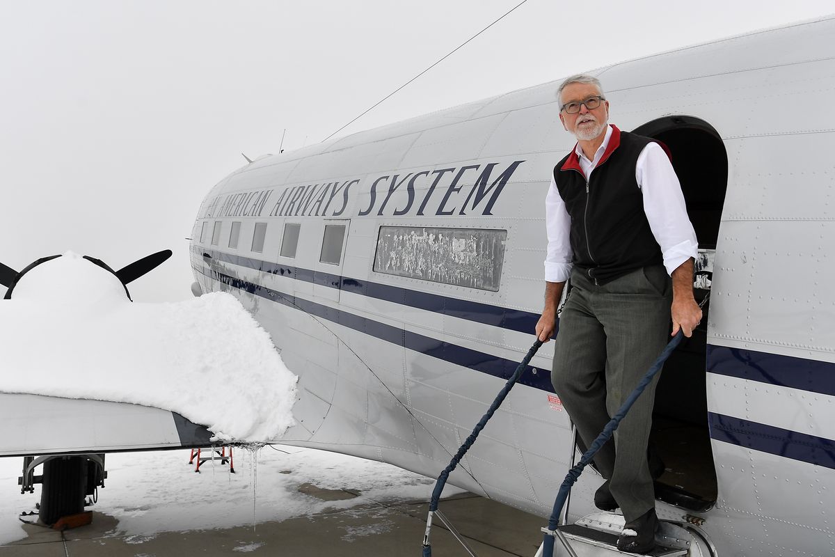 John Sessions smiles as he emerges from the Historic Flight Foundation’s Douglas DC-3 on Feb. 18, 2021, at Felts Field in Spokane.  (Tyler Tjomsland/THE SPOKESMAN-RE)
