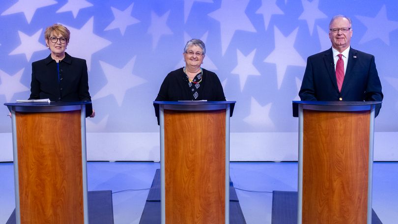 From left, Julie Ellsworth, Vicky McIntyre, and Tom Kealey debate during the 