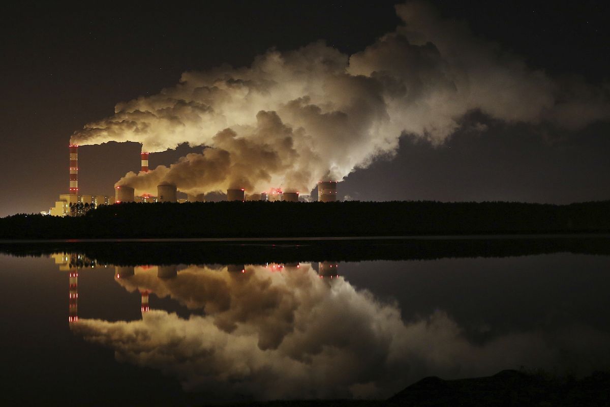 Clouds of vapor over Europe’s largest lignite power plant in Belchatow, central Poland, on Nov. 28, 2018.  (Czarek Sokolowski)