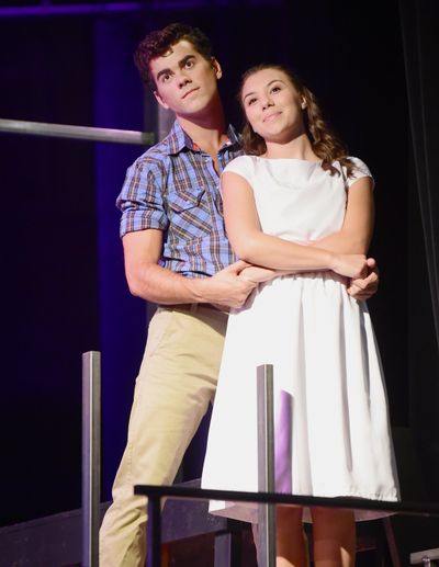 Duncan Menzies and Maddie Burgess play Tony and Maria in the Spokane Civic Theatre’s production of “West Side Story,” which has been extended for two more performances. (Jesse Tinsley / The Spokesman-Review)