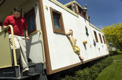 
Chris Weber steps down from the caboose outside the McDonald's restaurant Wednesday in Spokane's Hillyard neighborhood. 
 (Holly Pickett / The Spokesman-Review)