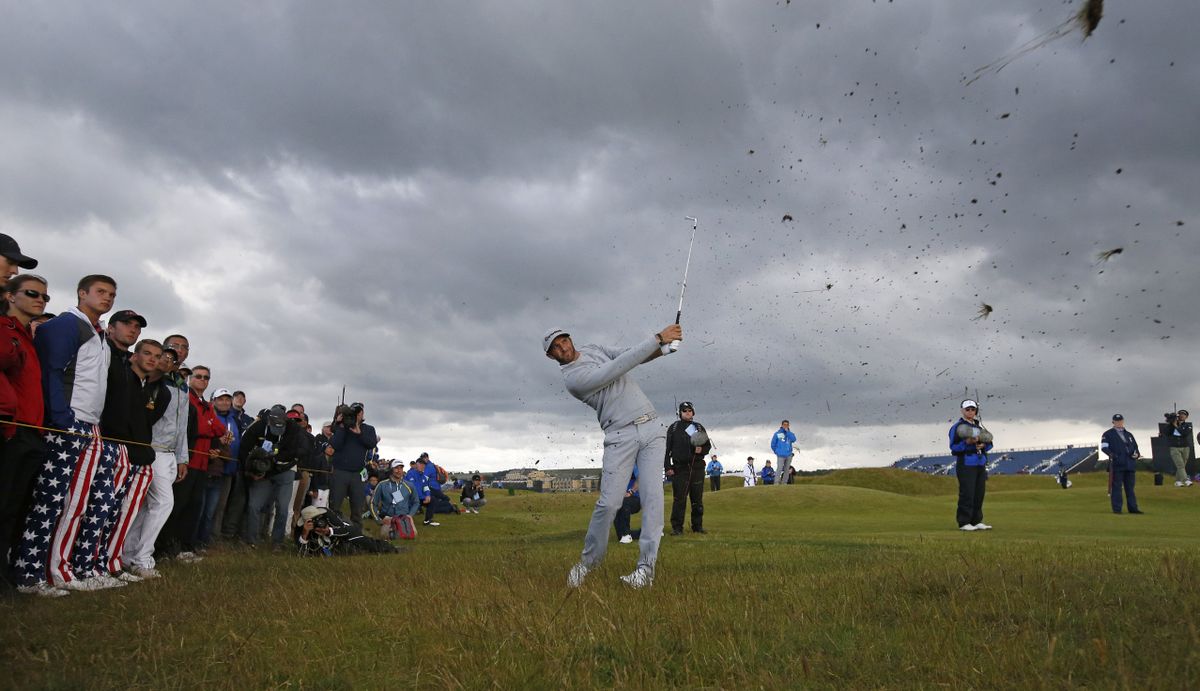 United States’ Dustin Johnson plays out of the rough on the 4th hole during the second round of the British Open at the Old Course, St. Andrews, Scotland on Friday. (AP)