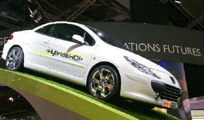 
View of the Peugeot Hybride HDI on the second press day at the Paris Auto Show. 
 (Associated Press / The Spokesman-Review)
