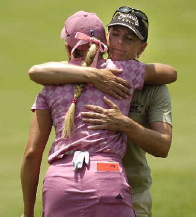 
Annika Sorenstam, right, hugs Natalie Gulbis after the ninth hole at Bulle Rock. 
 (Associated Press / The Spokesman-Review)