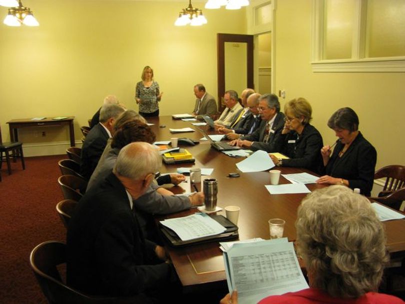 Members of the Joint Finance-Appropriations Committee gather for a 7 a.m. workshop meeting on Monday; they had been scheduled to set the public schools budget on Monday morning, but that was put off to Wednesday after House leadership asked for more time. So JFAC was left with the rest of its Monday agenda, smaller agencies including the Commission on Aging and the State Independent Living Council. (Betsy Russell)