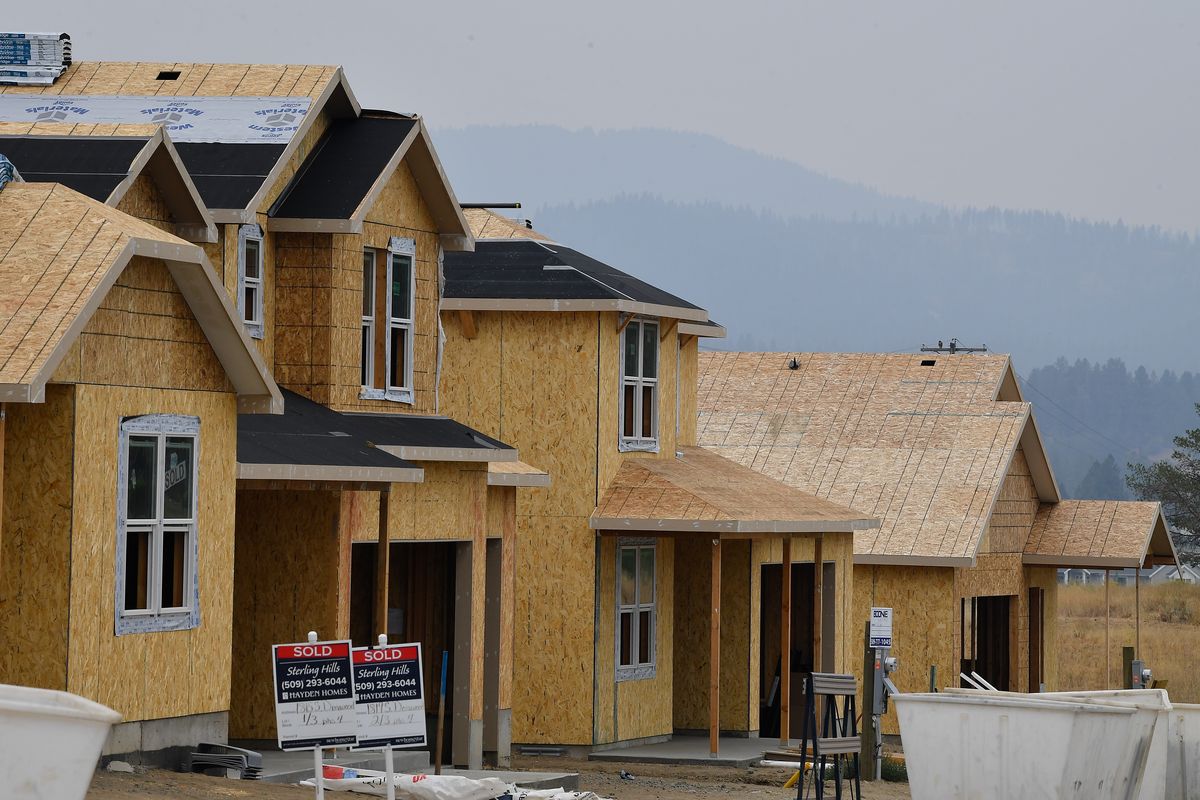 A group of houses being built by Hayden Homes are seen under construction on Sept. 10, 2021, in The Sterling Hills hosing development off of 19th Ave in Spokane Valley.  (Tyler Tjomsland/The Spokesman-Review)