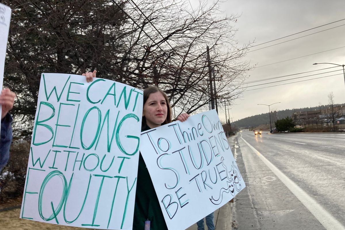 Adelaide Parsons, a Ridgeline High School senior, joined about 25 other students at a protest Monday to support teachers facing potential layoffs as they stood near Molter Road in Liberty Lake ahead of the Central Valley School Board meeting. Several students also spoke to board members during public comments at the meeting.  (Treva Lind/The Spokesman-Review)