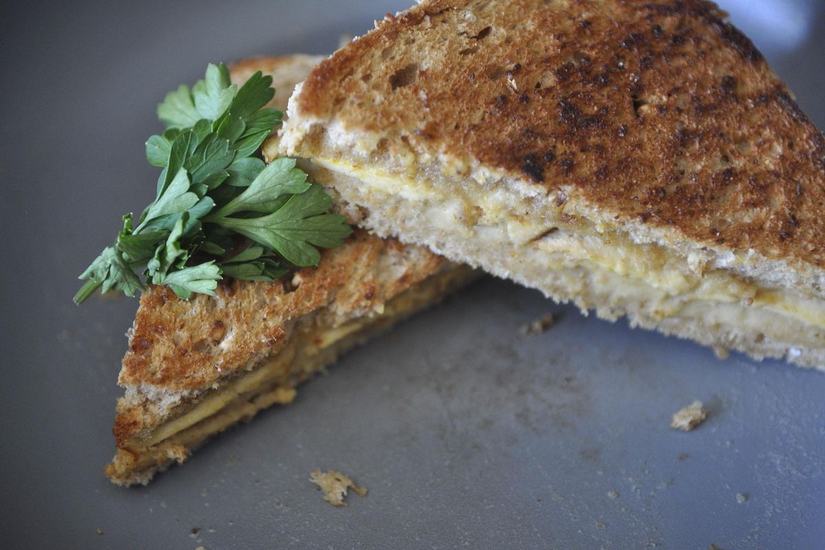 These vegan kid-friendly grilled sandwiches are stuffed with hummus instead of cheese. (Adriana Janovich / The Spokesman-Review)
