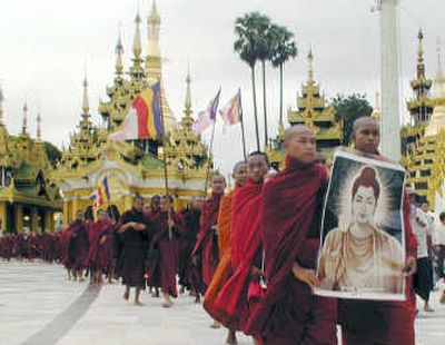 
Buddhist monks march at Shwedagon Pagoda during Sunday's protest against the military government in Yangon, Myanmar.Associated Press
 (Associated Press / The Spokesman-Review)