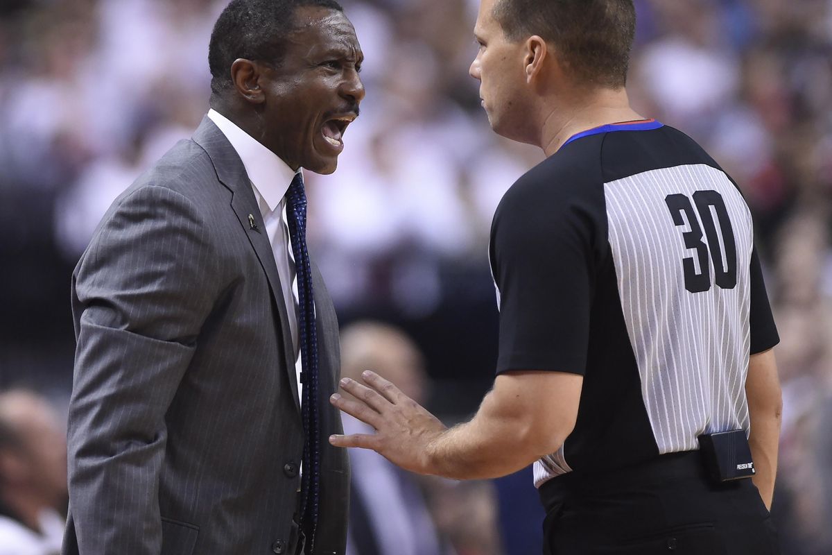 In this May 1, 2018 file photo, Toronto Raptors coach Dwane Casey, left, disputes a call during the first half of Game 1 of the team