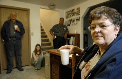 
Connie Lindgren listens Saturday at the south Spokane home of Gloria Wood to the streaming webcast of a speech by presidential candidate Sen. Barack Obama's held in Onawa, Iowa.
 (Photos by DAN PELLE / The Spokesman-Review)