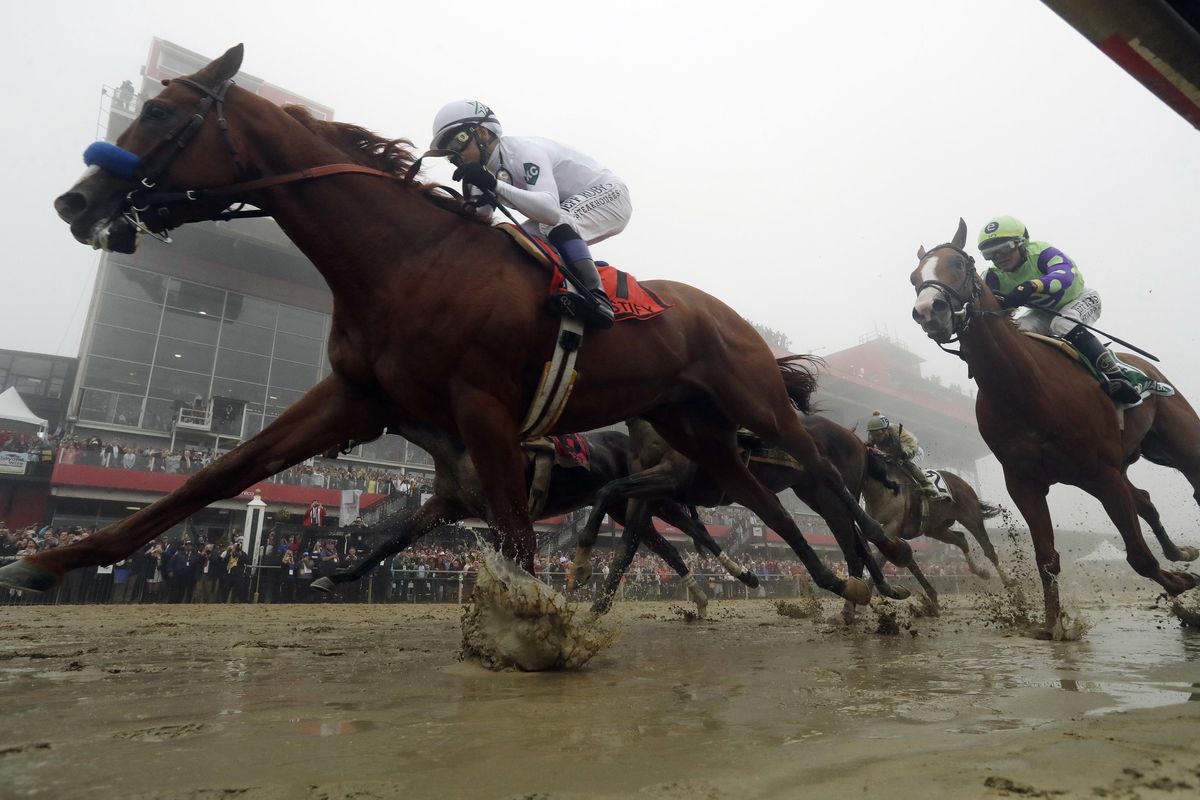 Justify with Mike Smith atop wins the the 143rd Preakness Stakes horse race at Pimlico race course, Saturday, May 19, 2018, in Baltimore. (Steve Helber / Associated Press)