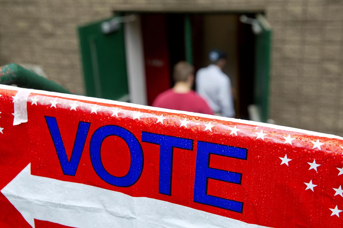 Voters walk in to cast their ballots in Georgia’s 6th Congressional District special election at a polling site in Sandy Springs, Ga., Tuesday, June 20, 2017. (David Goldman / Associated Press)