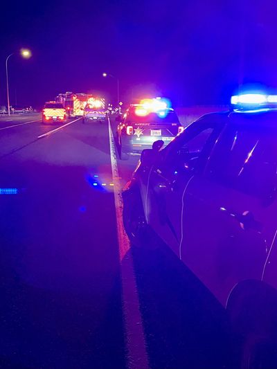 Law enforcement investigate a fatal crash involving a motorcyclist Tuesday night on U.S. Highway 2 near Brooks Road west of Airway Heights.  (Courtesy of Washington State Patrol)