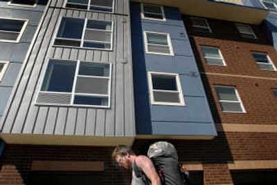 
Gonzaga senior Shay Logan of Plains, Mont., hauls belongings to the Kennedy Apartments on Thursday before the start of the school year. 
 (Photos by Brian Plonka / The Spokesman-Review)