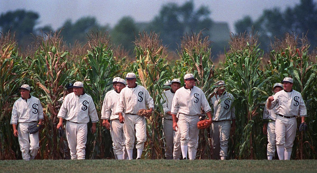 Persons portraying ghost player characters, similar to those in the film "Field of Dreams," emerge from the cornfield at the "Field of Dreams" movie site in Dyersville, Iowa, in this undated file photo. Three decades after Kevin Costner