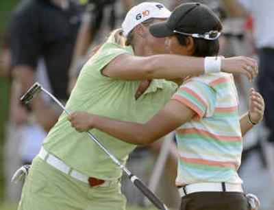 
Yani Tseng, right, became the second youngest woman to win a major at the McDonald's LPGA Championship.Associated Press
 (Associated Press / The Spokesman-Review)