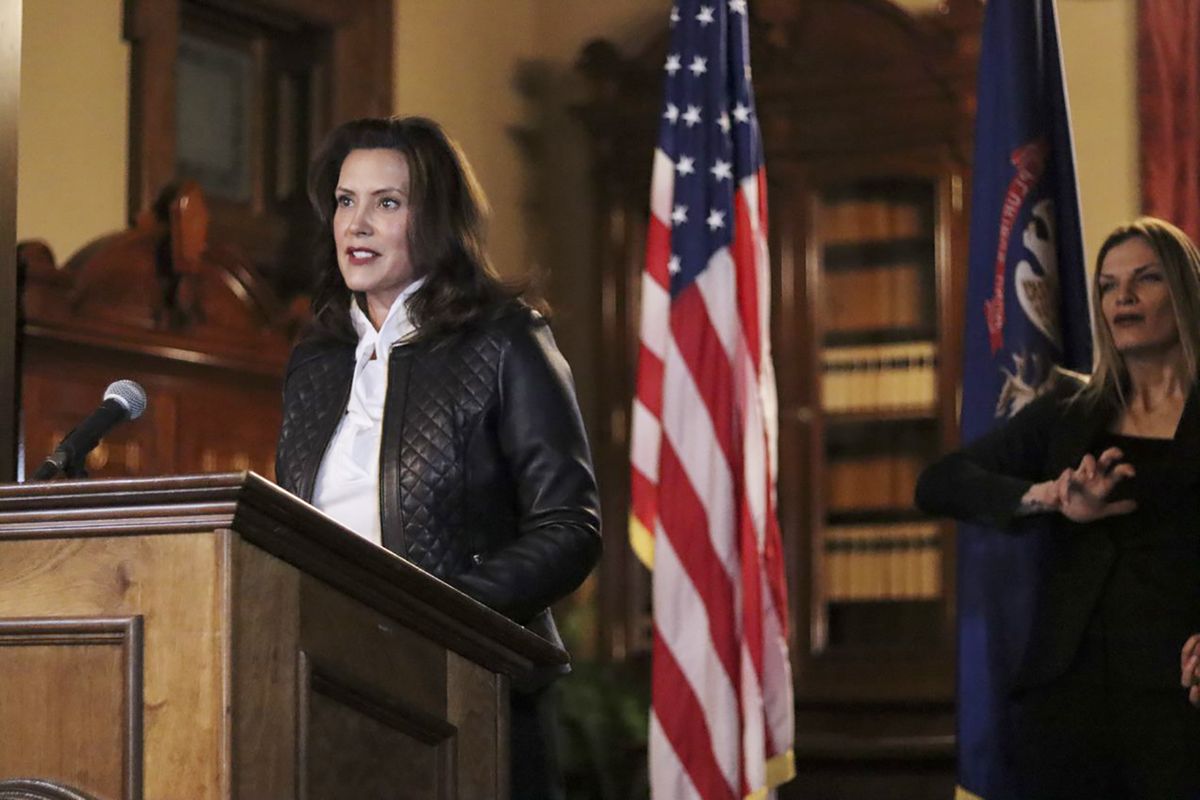 In a photo provided by the Michigan Office of the Governor, Michigan Gov. Gretchen Whitmer addresses the state during a speech in Lansing, Mich., Thursday, Oct. 8, 2020. The governor delivered remarks addressing Michiganders after the Michigan Attorney General, Michigan State Police, U.S. Department of Justice, and FBI announced state and federal charges against 13 members of two militia groups who were preparing to kidnap and possibly kill the governor.  (HOGP)