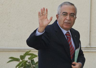 Palestinian Prime Minister Salam Fayyad arrives for a meeting in Ramallah  Saturday.  (Associated Press / The Spokesman-Review)