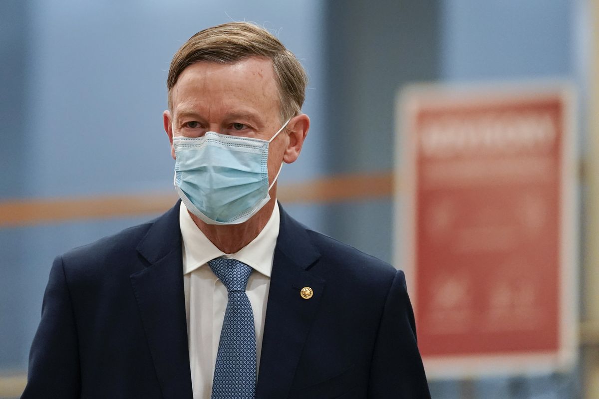 Sen. John Hickenlooper, D-Colo., arrives on Capitol Hill in Washington, Saturday, Feb. 13, 2021, on the fifth day of the second impeachment trial of former President Donald Trump.  (Alex Brandon)